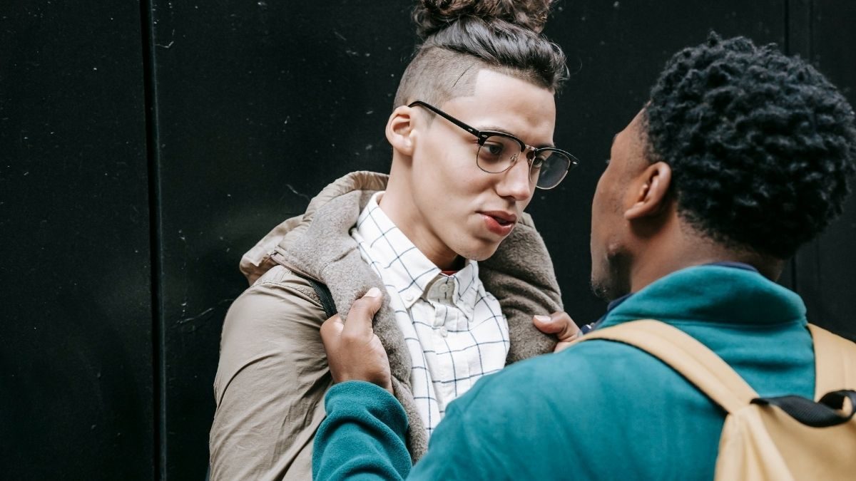 An example self-defense scenario of a person being grabbed by the collar with two hands