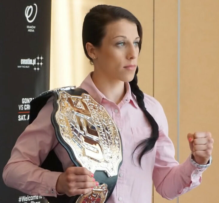 Joanna Jedrzejczyk holding her UFC Championship Belt in 2015