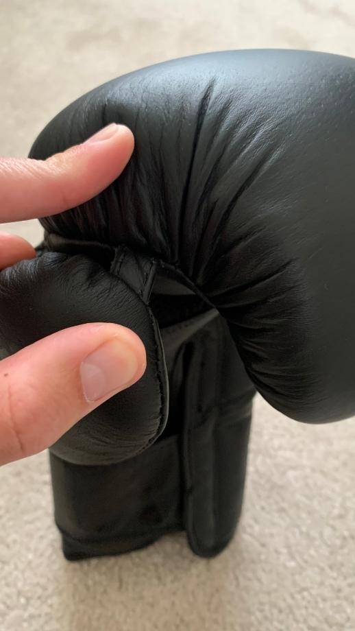 Closeup of thumb attachment on Anthem Athletics Stormbringer II Boxing Glove