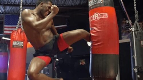 jon jones kicking heavy bag in mma gym