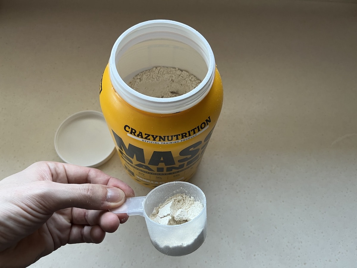 One scoop of Mass Gainer from the tub
