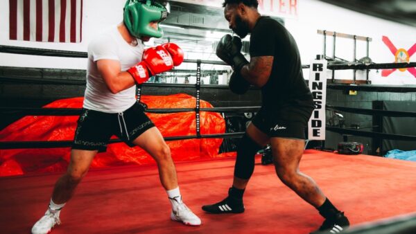 Boxers sparring wearing boxing shoes