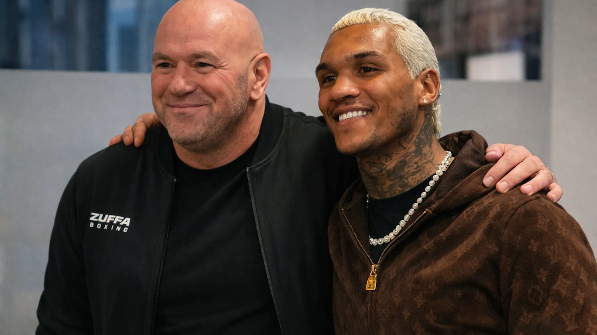 dana white and conor benn taking a photo after agreeing on zuffa boxing deal